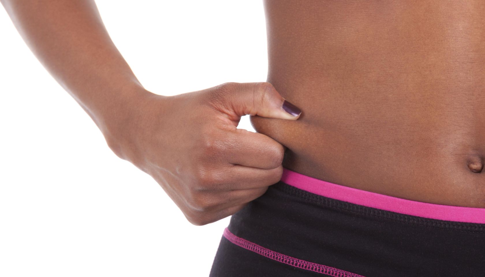 Belly of a young sexy african american woman, isolated on white background