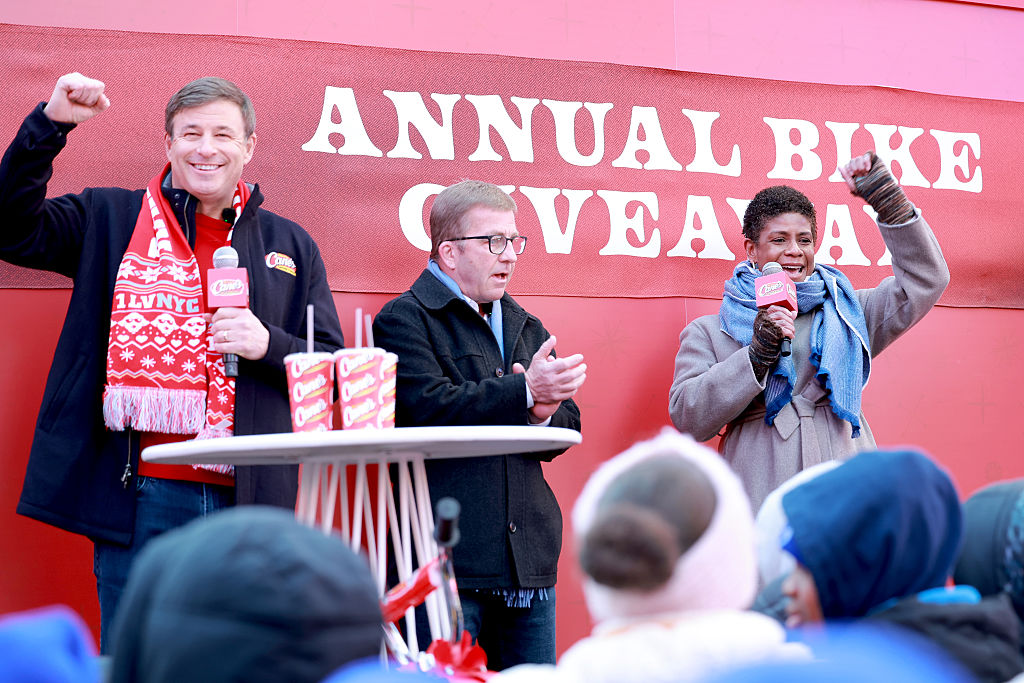 'A Christmas Story' Star Peter Billingsley Joins Raising Cane's Owner And Founder Todd Graves In Times Square For Annual Bike Giveaway To Harlem Boys & Girls Club
