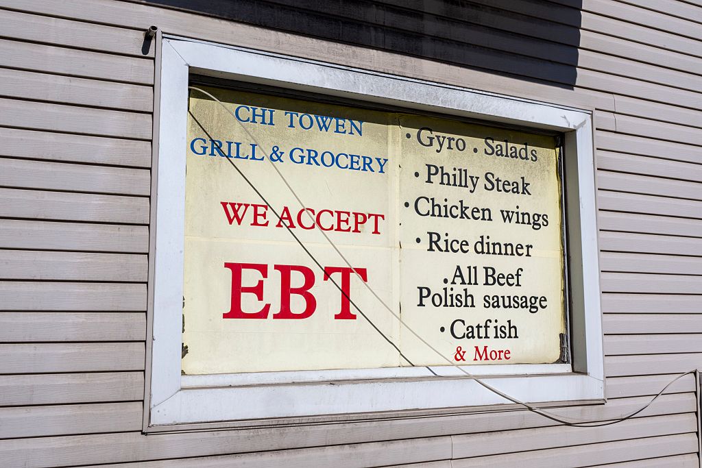 EBT sign in the window of a small local neighborhood grocery store in Minnesota